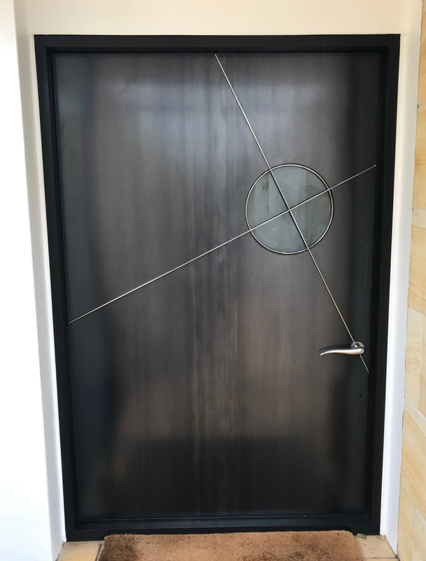 Steel door with custom design
